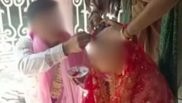 Hindu man marries Muslim woman, her relatives threaten to falsely implicate him in a rape case