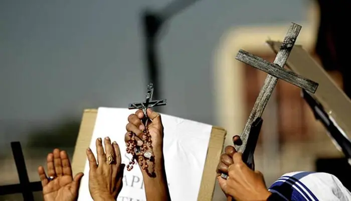 Hindu residents targeted and offered inducements to convert to Christianity; derogatory remarks made against Hinduism